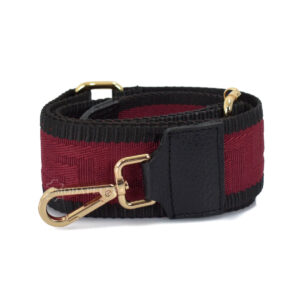 Adjustable bag strap, in red color (meander texture). With gold metallic parts and leather finishes