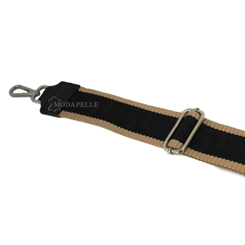 Adjustable bag strap, in black color (meander texture). With silver metallic parts and leather finishes